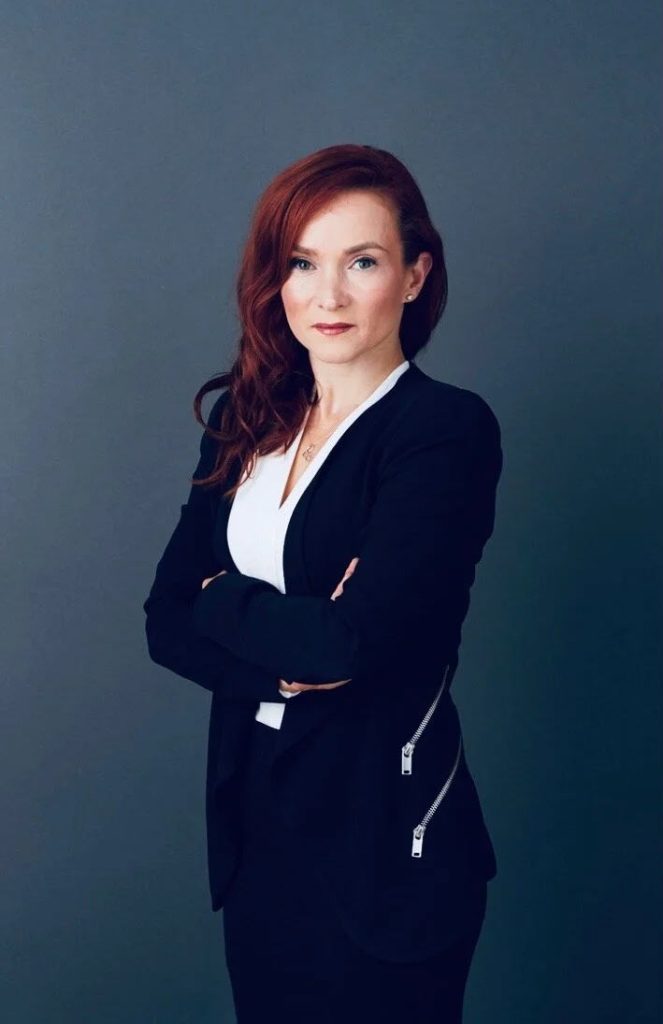 Headshot of Renee Pugh, U.S. Immigration Attorney and O-1 Visa Specialist licensed in New York and Alberta.